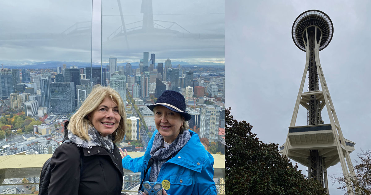 Olympic Space Needle and with a view of city with Debbra and Linda