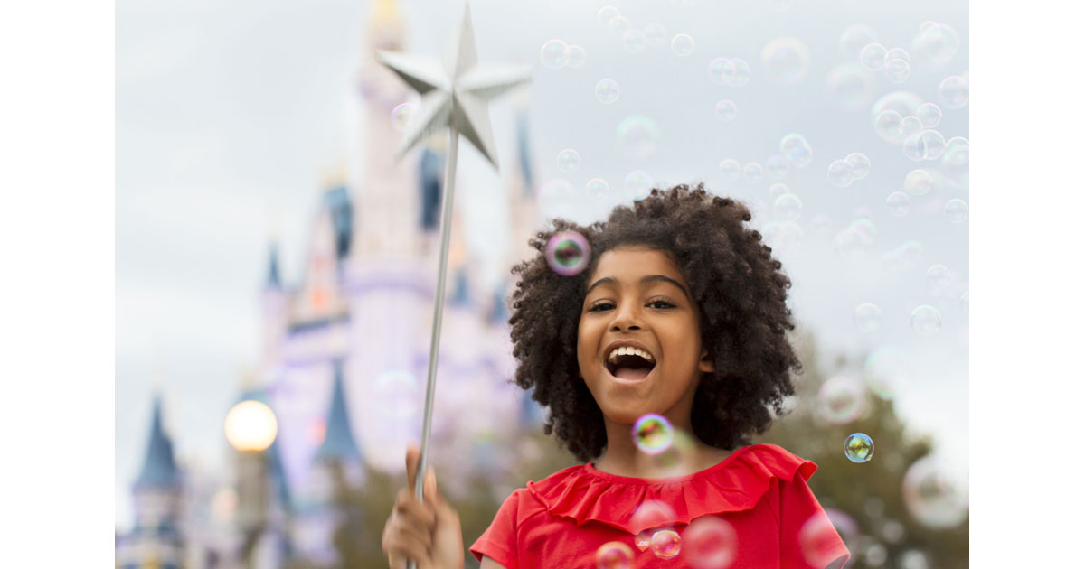 Young girl enjoying the Magic Kingdom Park, Walt Disney World in Florida - CityPASS